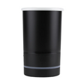 Black cylindrical container with a white top on a light gray background